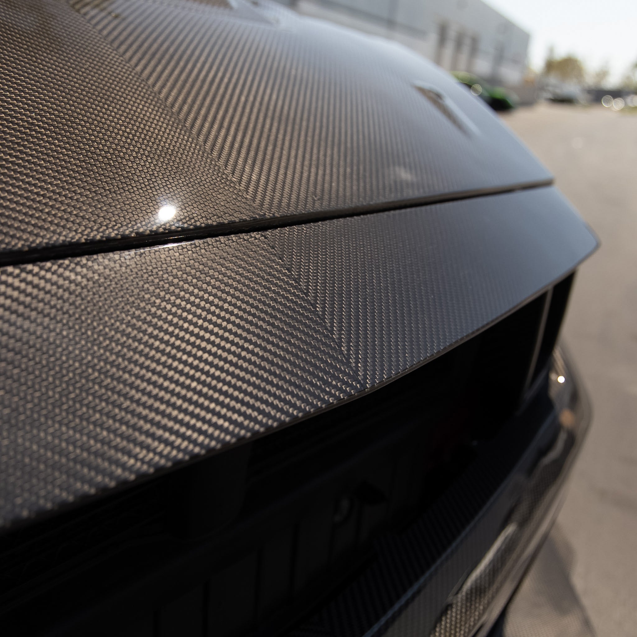 2024 Ford Mustang S650 V-Shaped gloss carbon fiber bumper kit with top ABS grille and front splitter