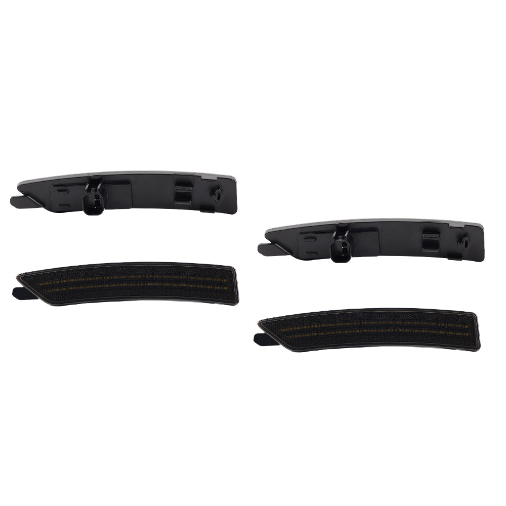 Set of black plastic car parts on a white background