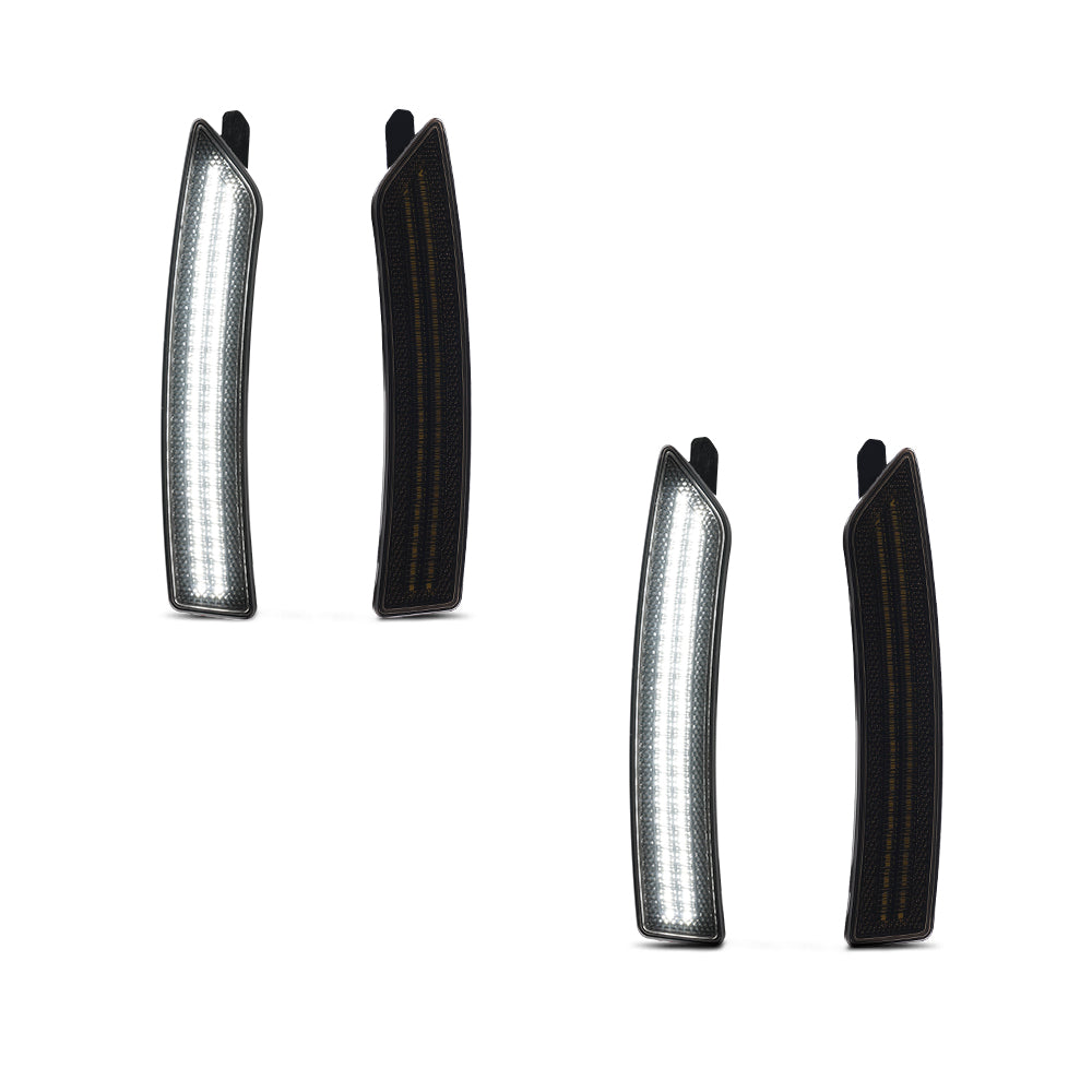 Four car side mirror covers on a white background