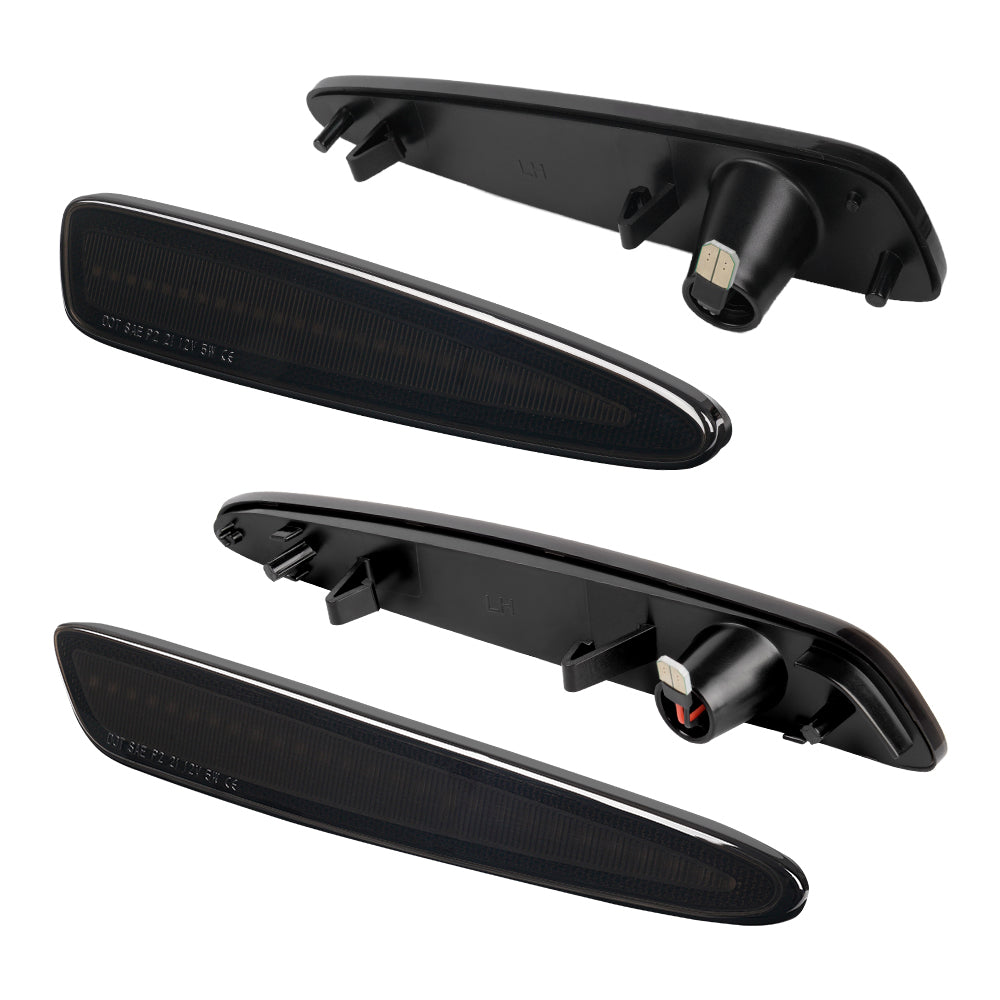 Three black car exterior door handles on a white background