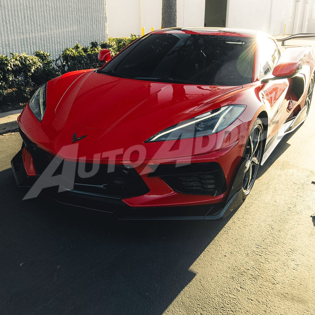 Red Corvette C8 Stingray with Auto Addict USA EVO Kit installed, front 3/4 view