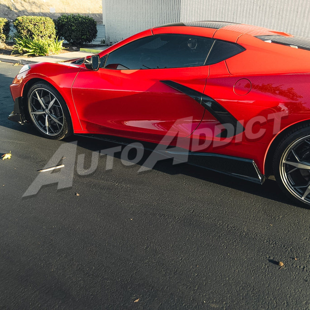 Corvette C8 Stingray EVO style gloss black side skirts installed