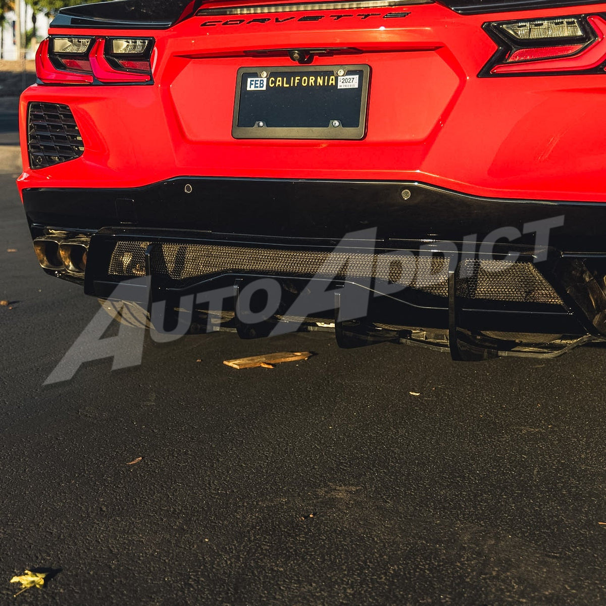 Corvette C8 Stingray rear view with gloss black shark fin diffuser