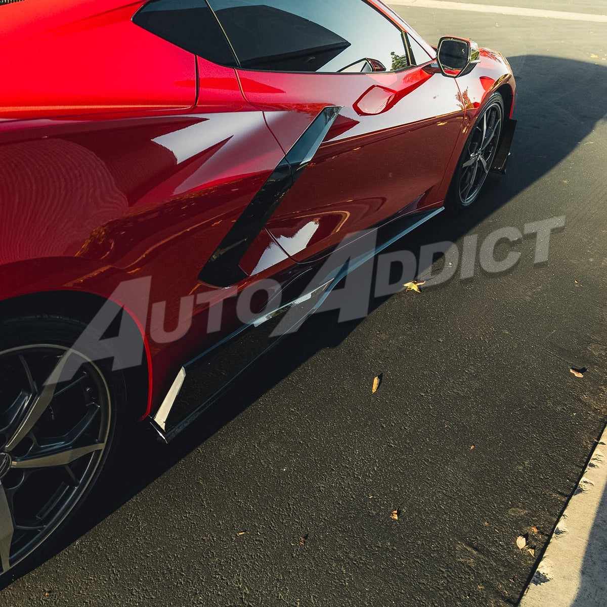 Gloss black EVO side skirt installed on Corvette C8 Stingray
