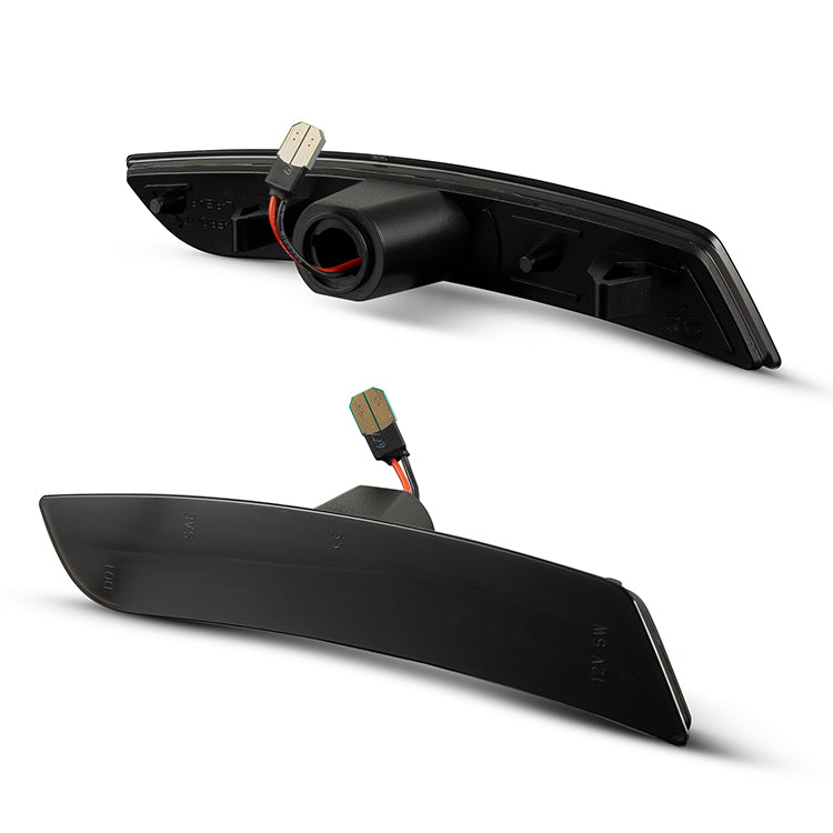 Two black car side mirrors on a white background