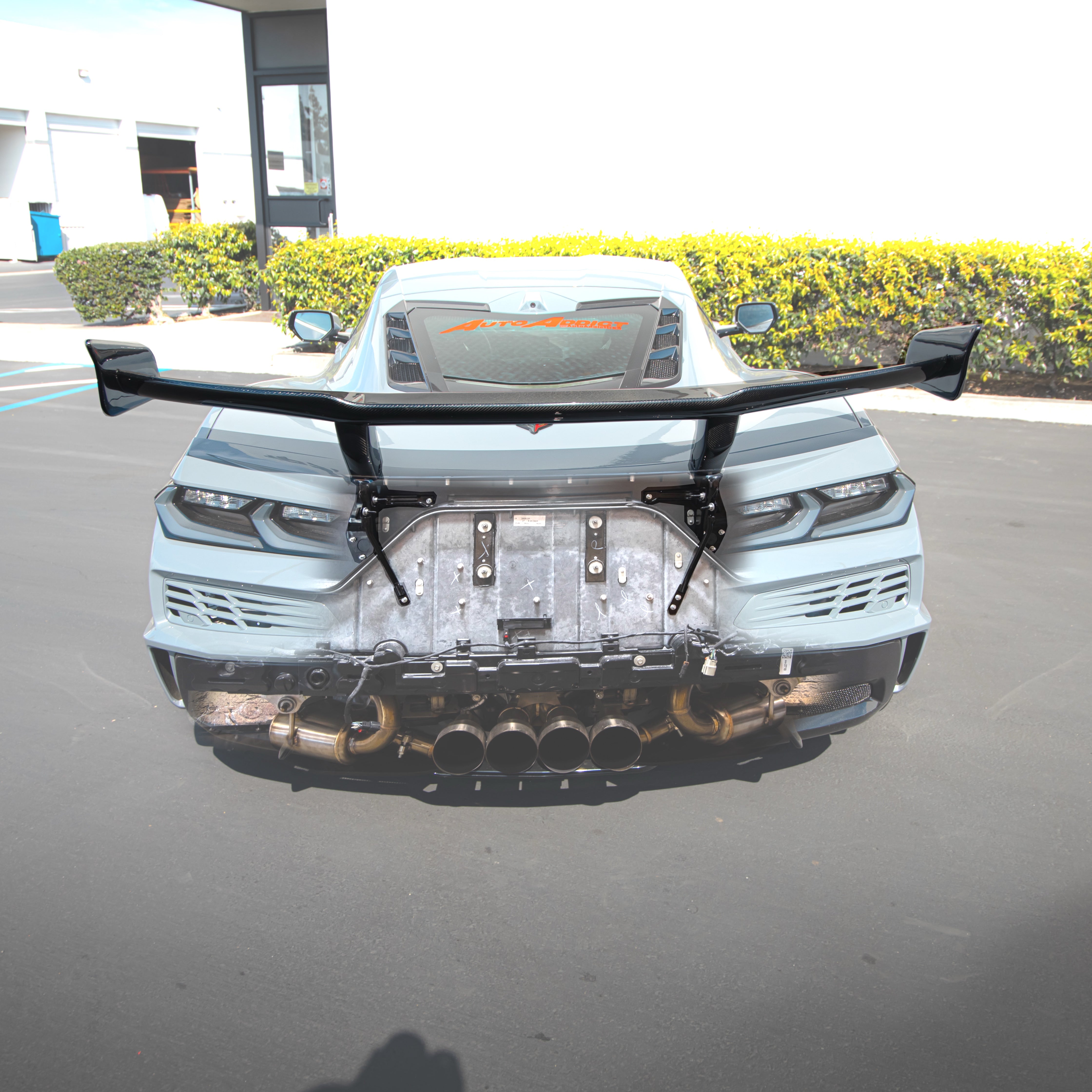 Auto Addict USA C8 Z06 ZR1 ZTK style carbon fiber rear spoiler installed with Z07 chassis mount brackets