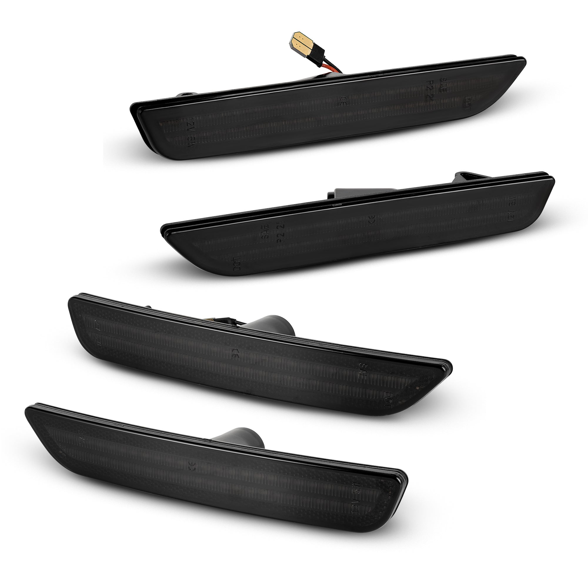 Set of five black car side mirrors on a white background