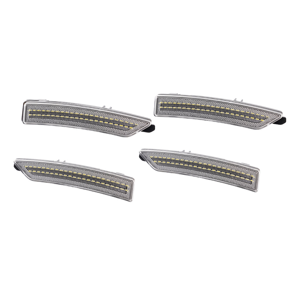 Four car side marker lights on a white background