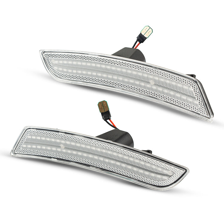 Two car bumper lights with wiring on a white background
