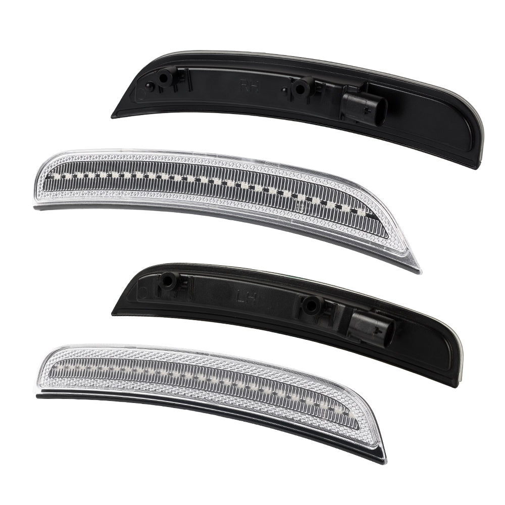 Set of four car side mirrors with black and clear reflective surfaces on a white background