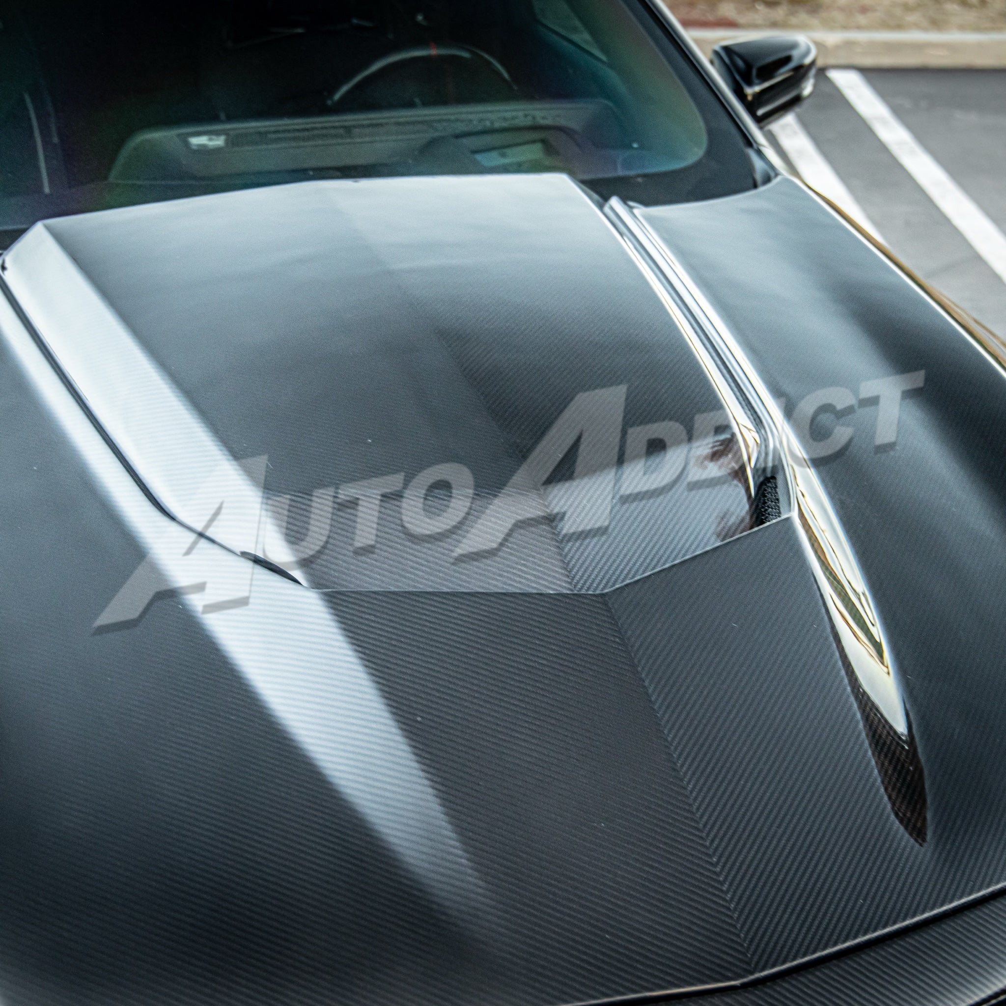 Installed Auto Addict USA Heritage Spec Hood passenger-side angle on Cadillac CT5