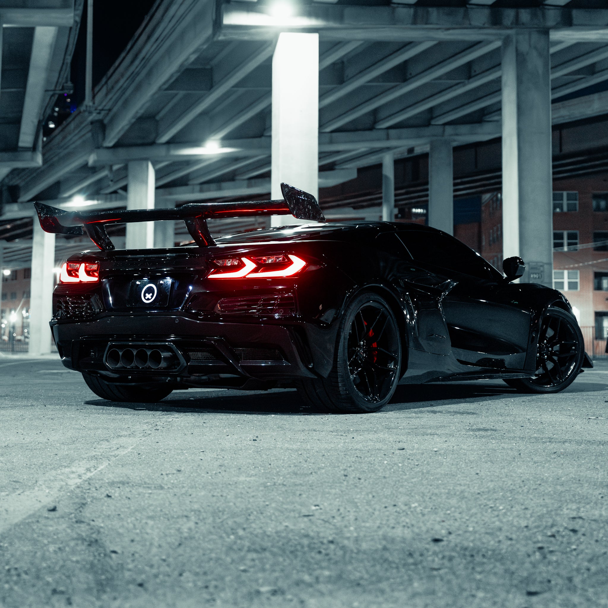 Installed C8 Z06 forged carbon front splitter and side skirt package Quiet Racing Dallas build
