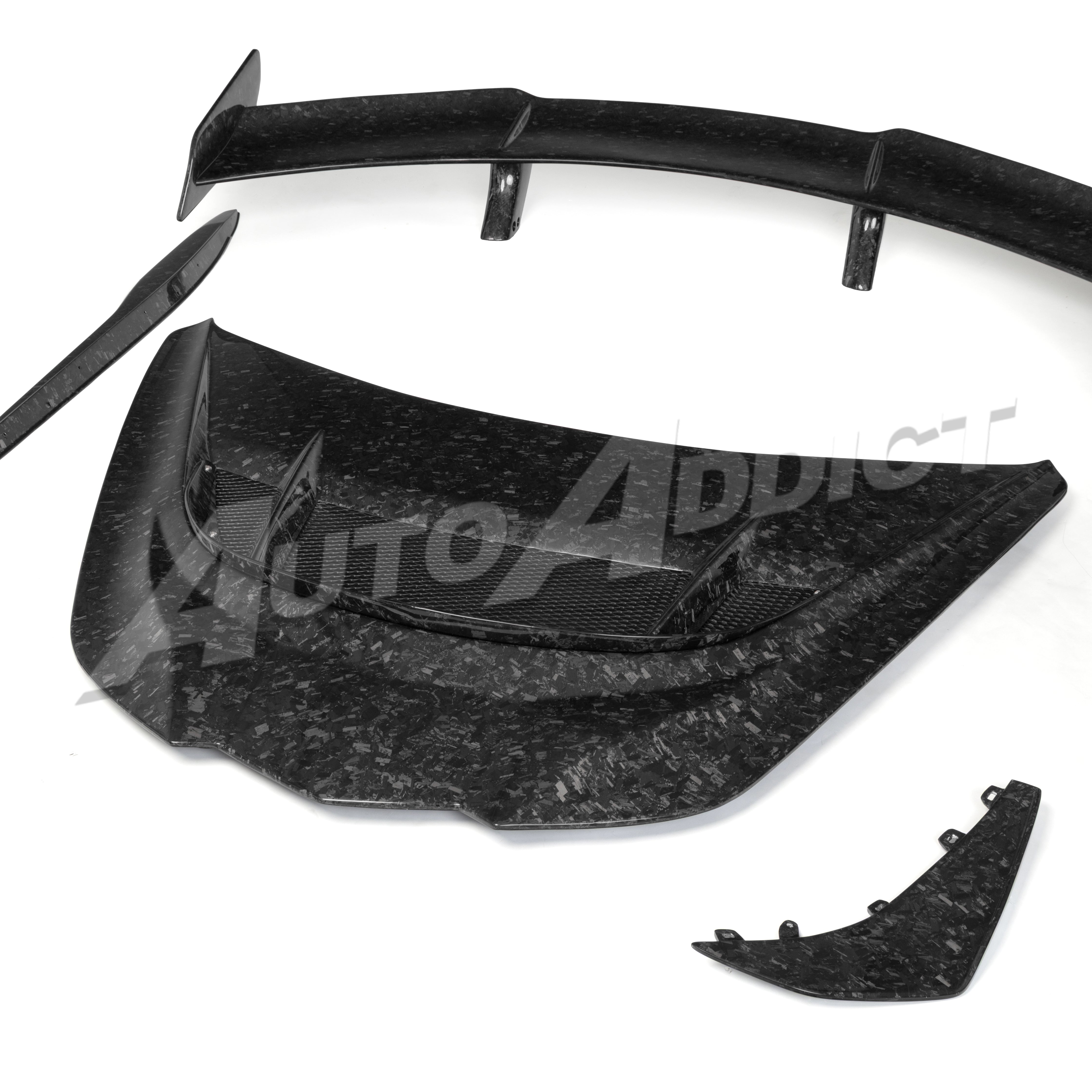 Installed Chevrolet Corvette C8 forged carbon ZR1 style hood and full aero package
