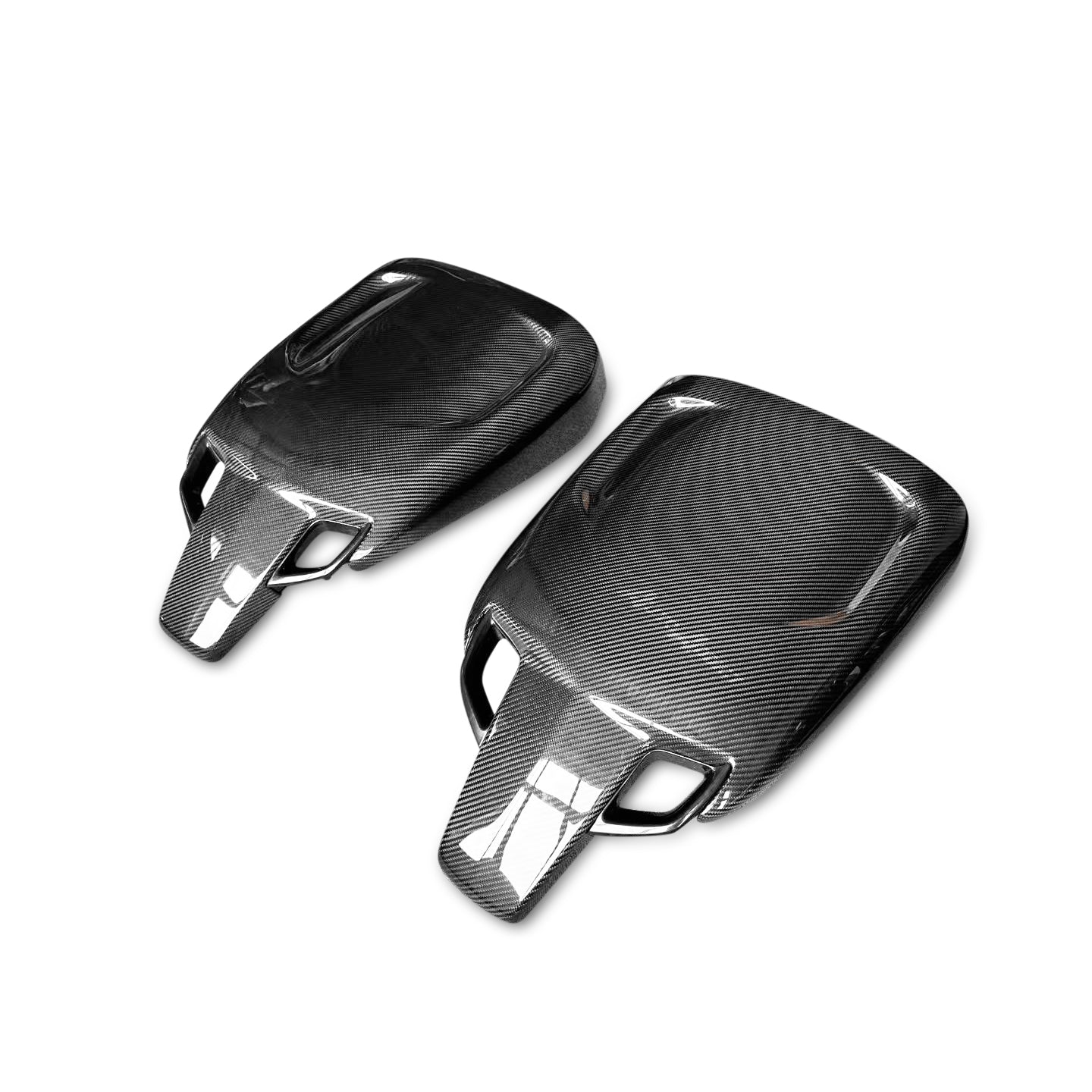 Two carbon fiber motorcycle seat covers on a white background